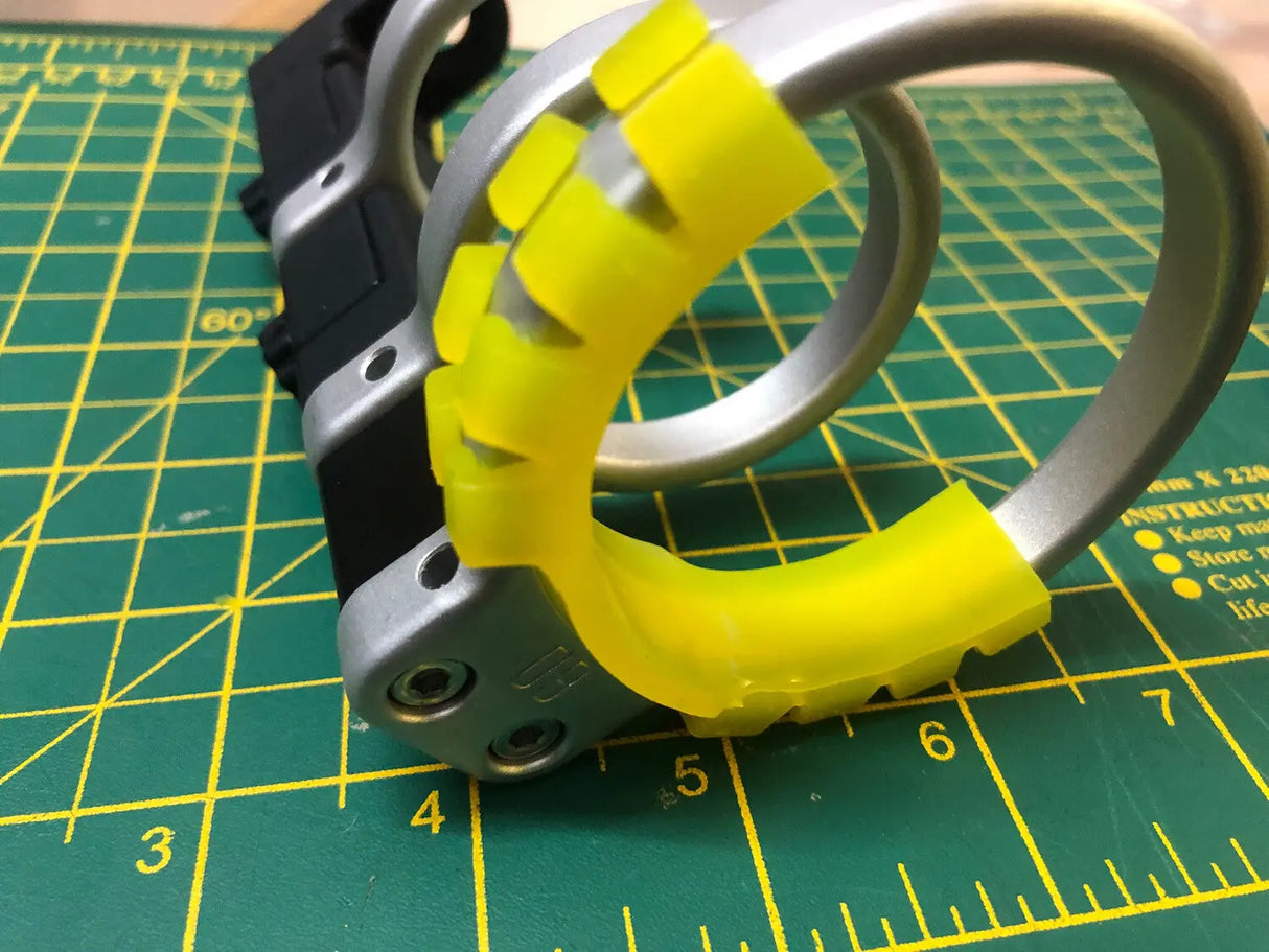 Image showing a yellow insulator clipped to a 60mm diameter Electro Ring