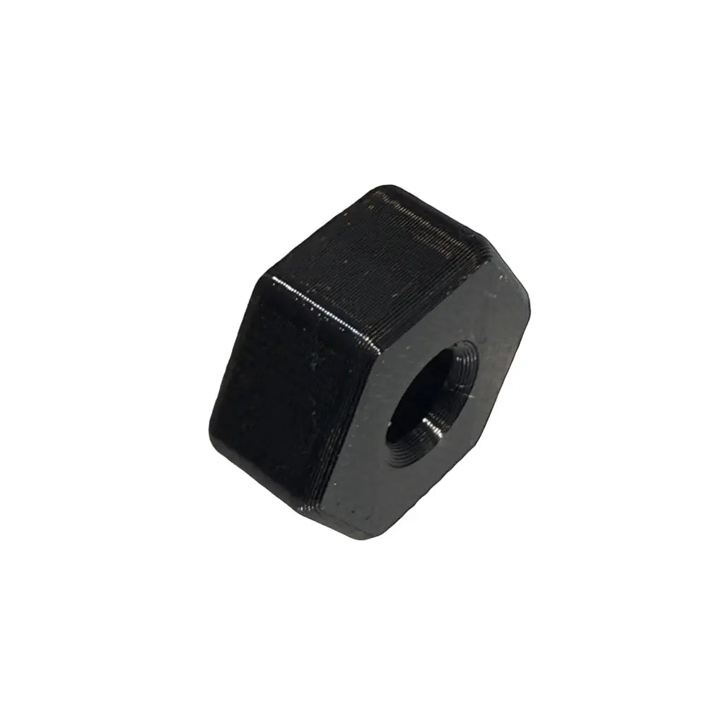 Black hexagonal nut on a white background