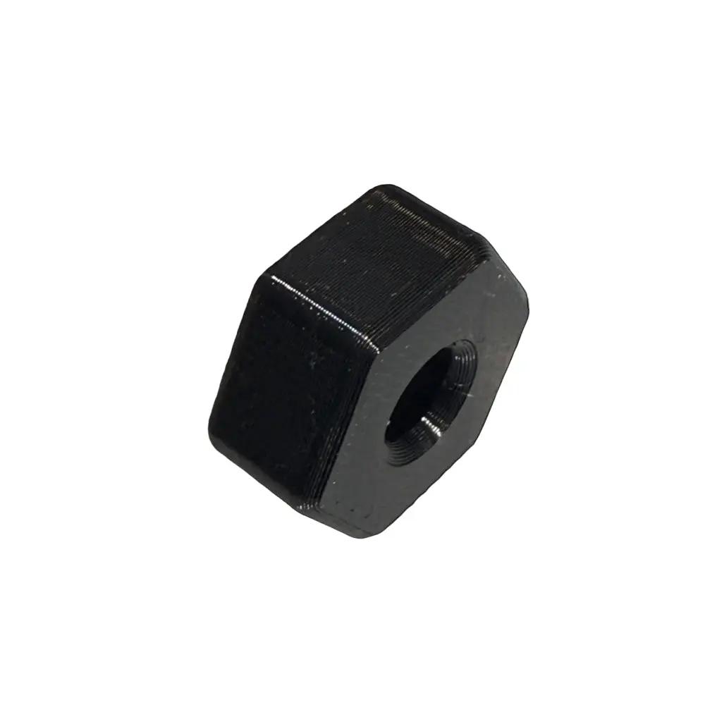 Black hexagonal nut on a white background