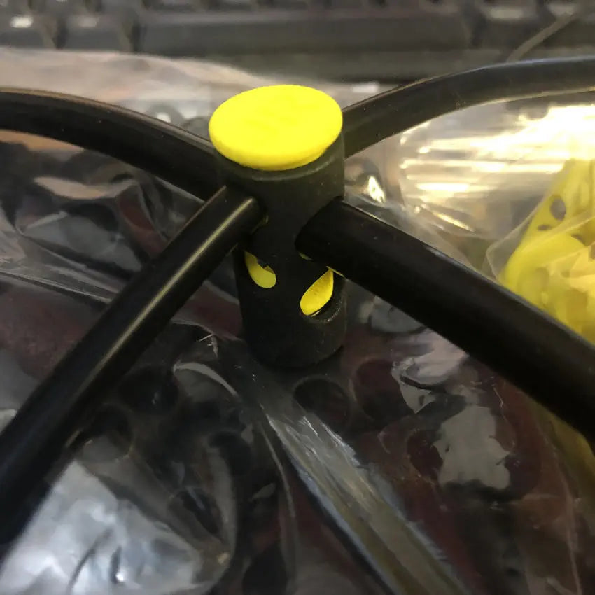 Image showing a 8mm/6mm CR cord lock with 6mm and 8mm CR inserted