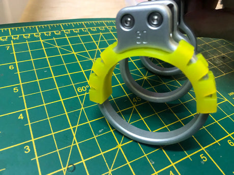 Image showing a yellow insulator clipped to a 60mm diameter Electro Ring