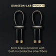 Two black conductive rubber loops with brass ends on a black background, featuring Dungeon-Lab branding.