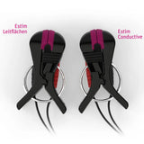 Two black electrode clip devices with pink textured strips and red inner padding, shown on a white background with German text labels 'Estim Leitflächen' and 'Estim Conductive'.