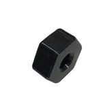 Black hexagonal nut on a white background