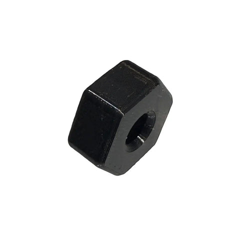 Black hexagonal nut on a white background