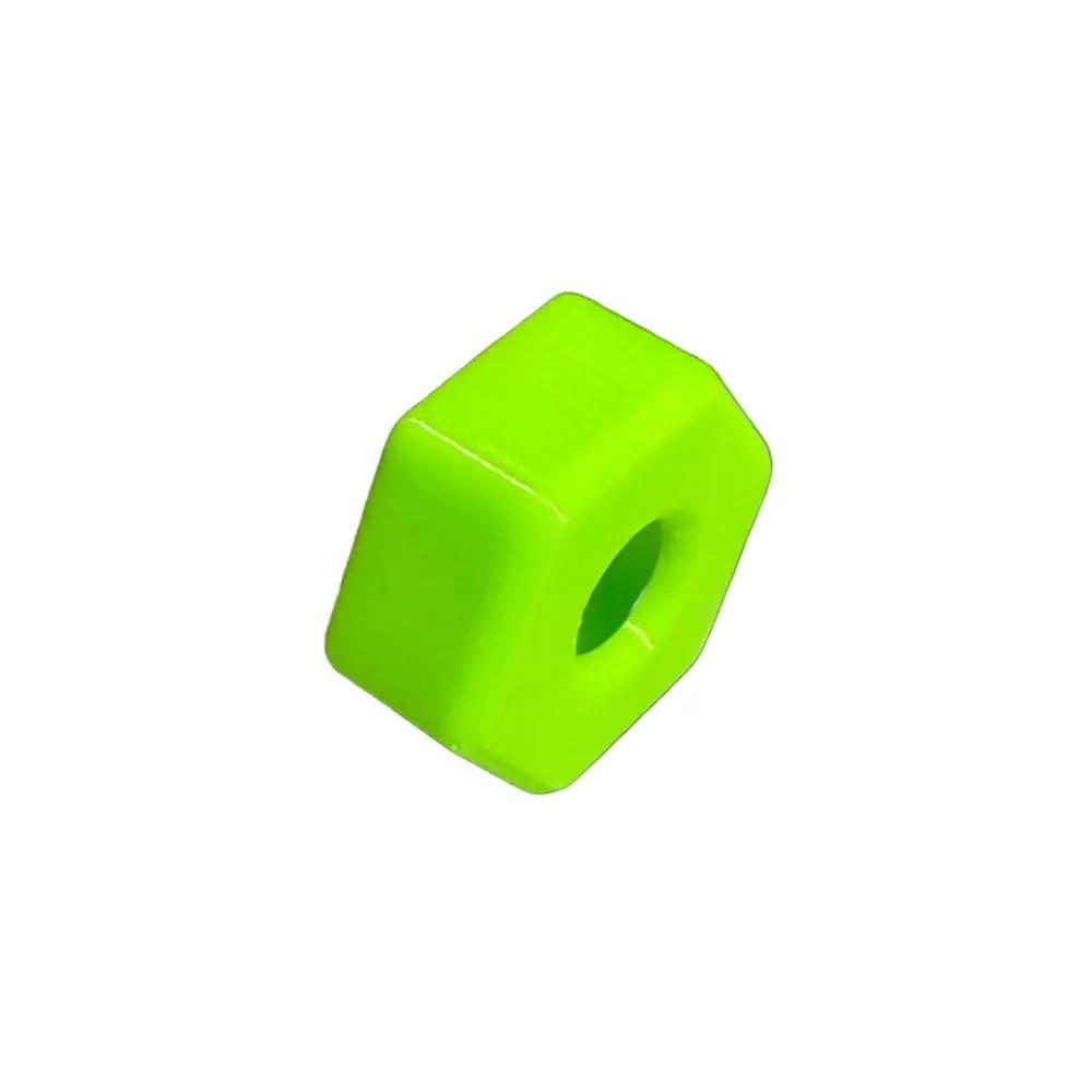 Hexagonal green plastic washer on a white background